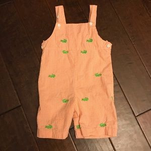 Orange gingham romper with embroidered alligators